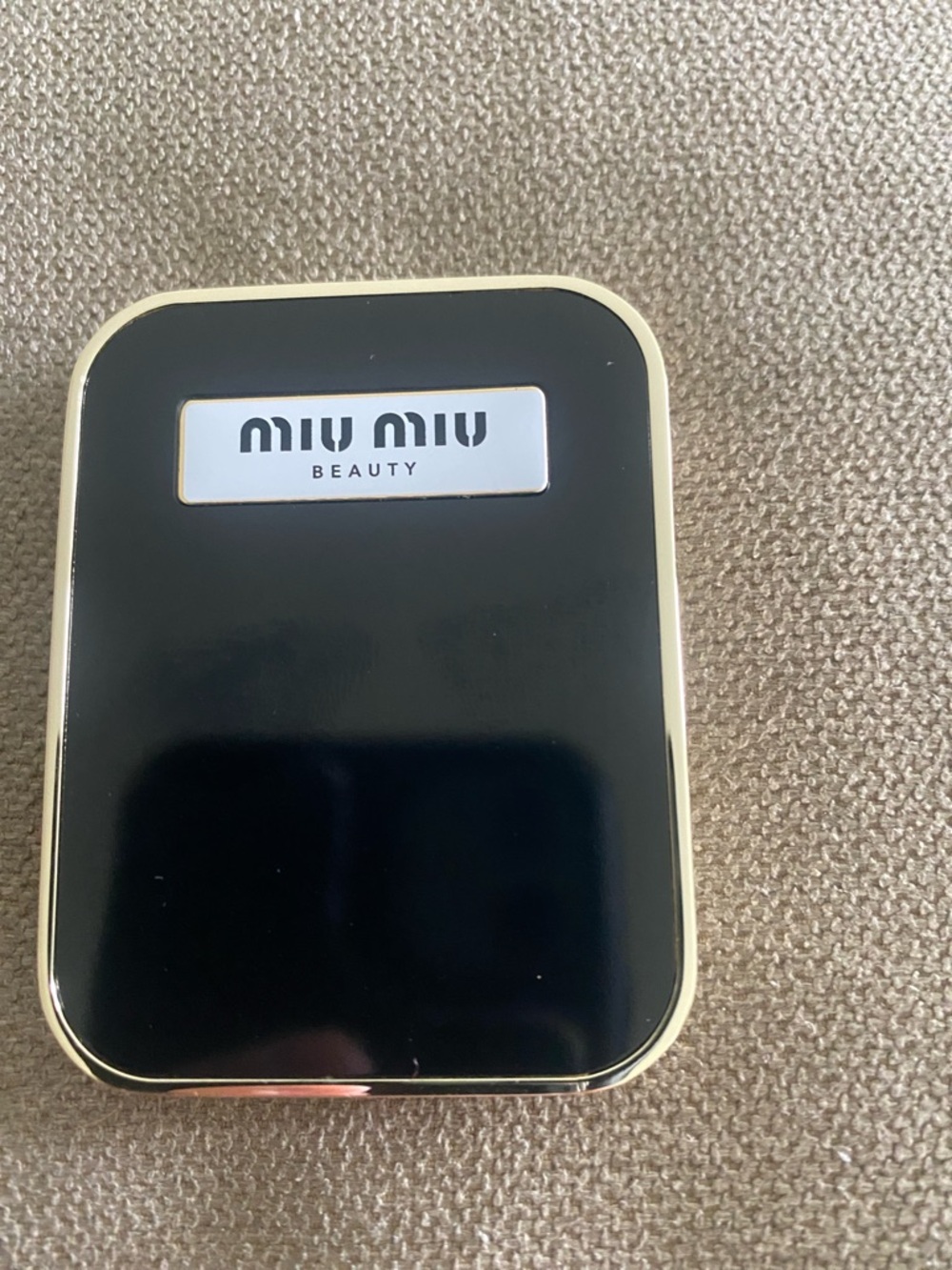 Miu Miu Black and Gold Compact mirror brand new.